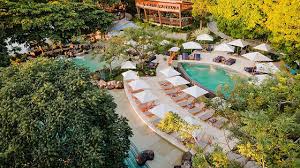 Andaz Costa Rica Resort at Peninsula Papagayo luxury boutique hotel with treehouse-style design, infinity pools, and rainforest setting.