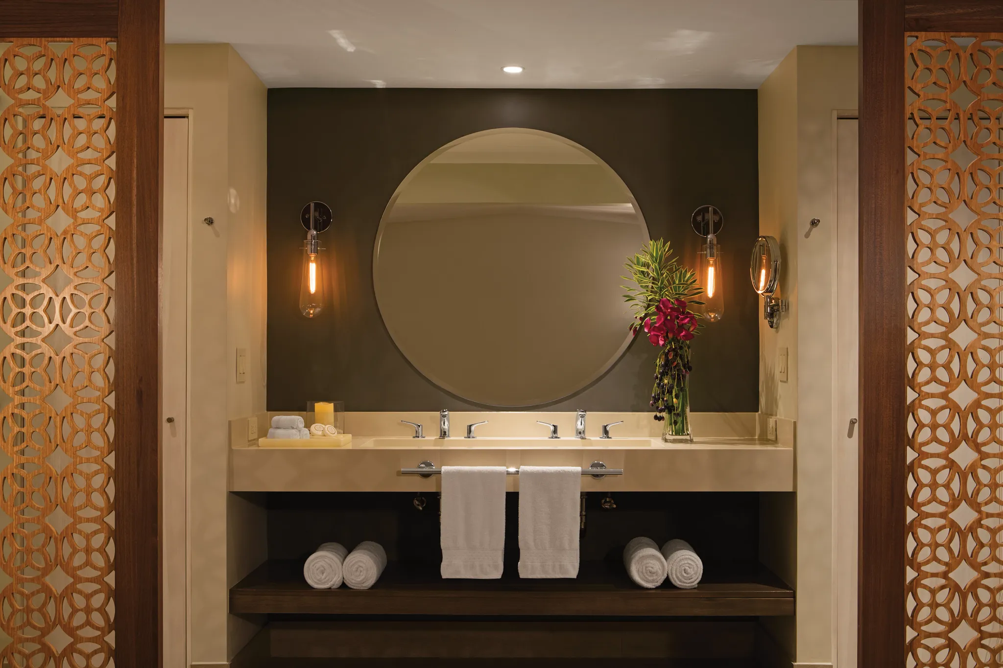 Bungalow Suite Tropical View bathroom with double vanity and modern lighting at Secrets Papagayo Costa Rica.