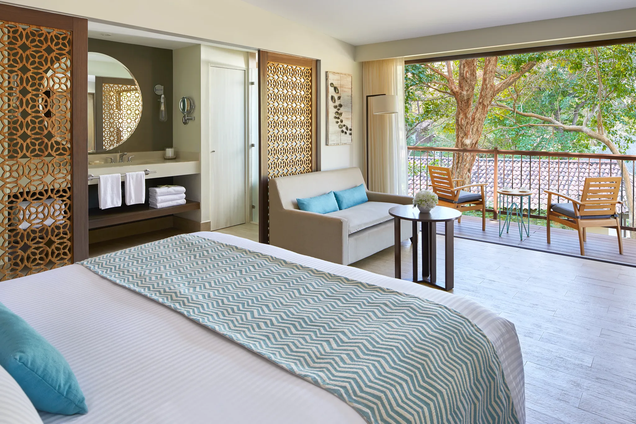 Bungalow Suite Tropical View with king-size bed at Secrets Papagayo Costa Rica.