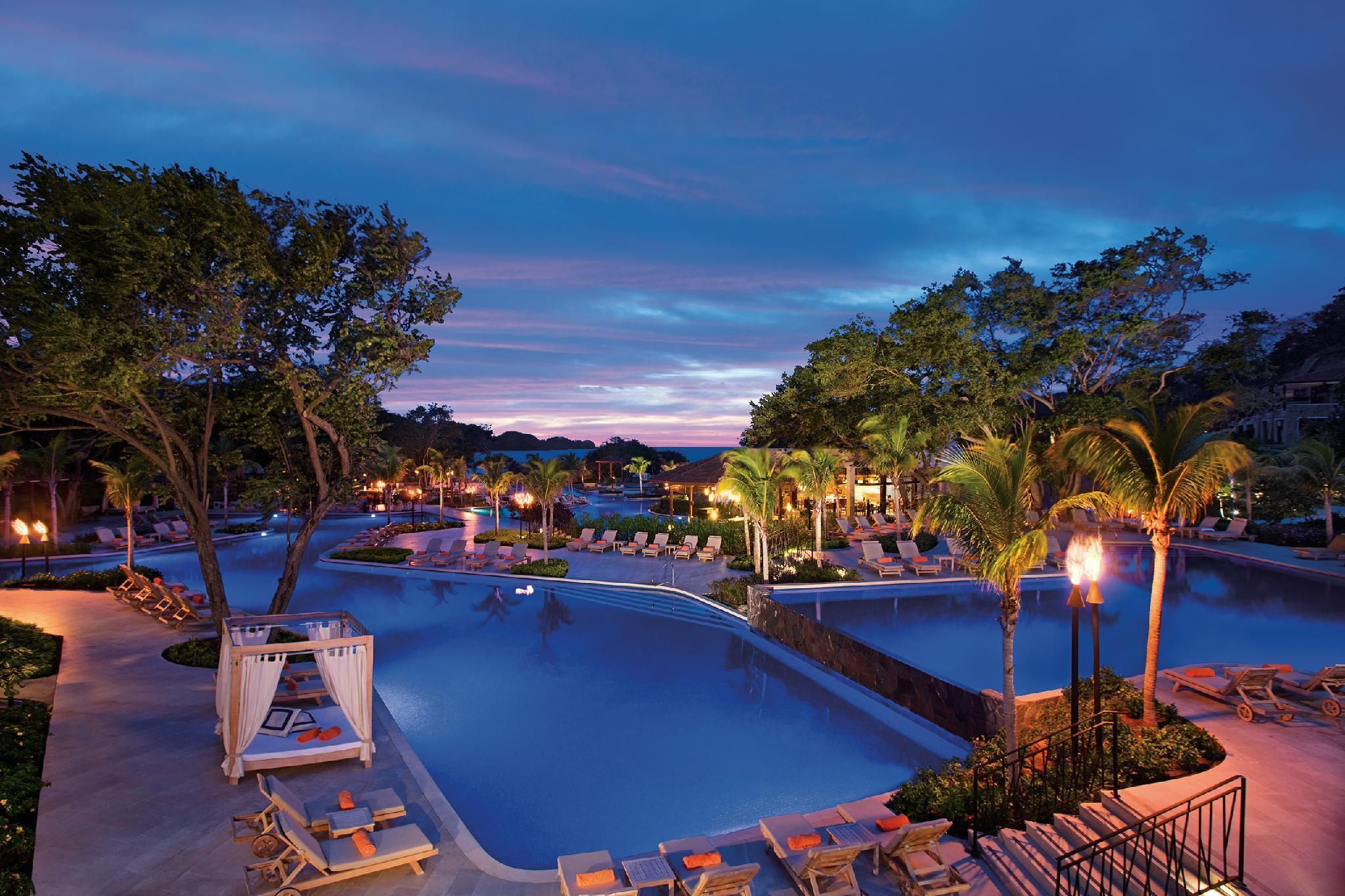 Dreams Las Mareas Costa Rica family-friendly all-inclusive resort with beachfront pools, lush gardens, and tropical setting in Guanacaste.