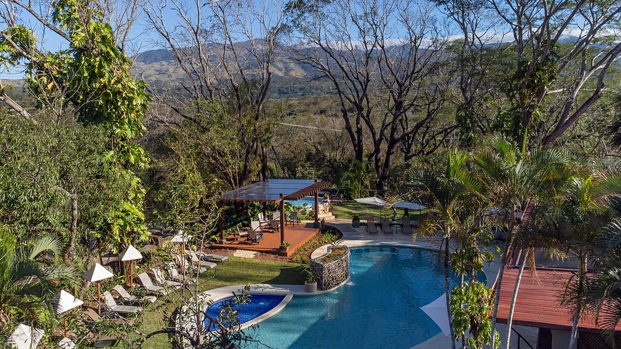 Hacienda Guachipelin Volcano Ranch Hotel in Guanacaste Costa Rica with volcanic hot springs, adventure activities, and ranch setting.