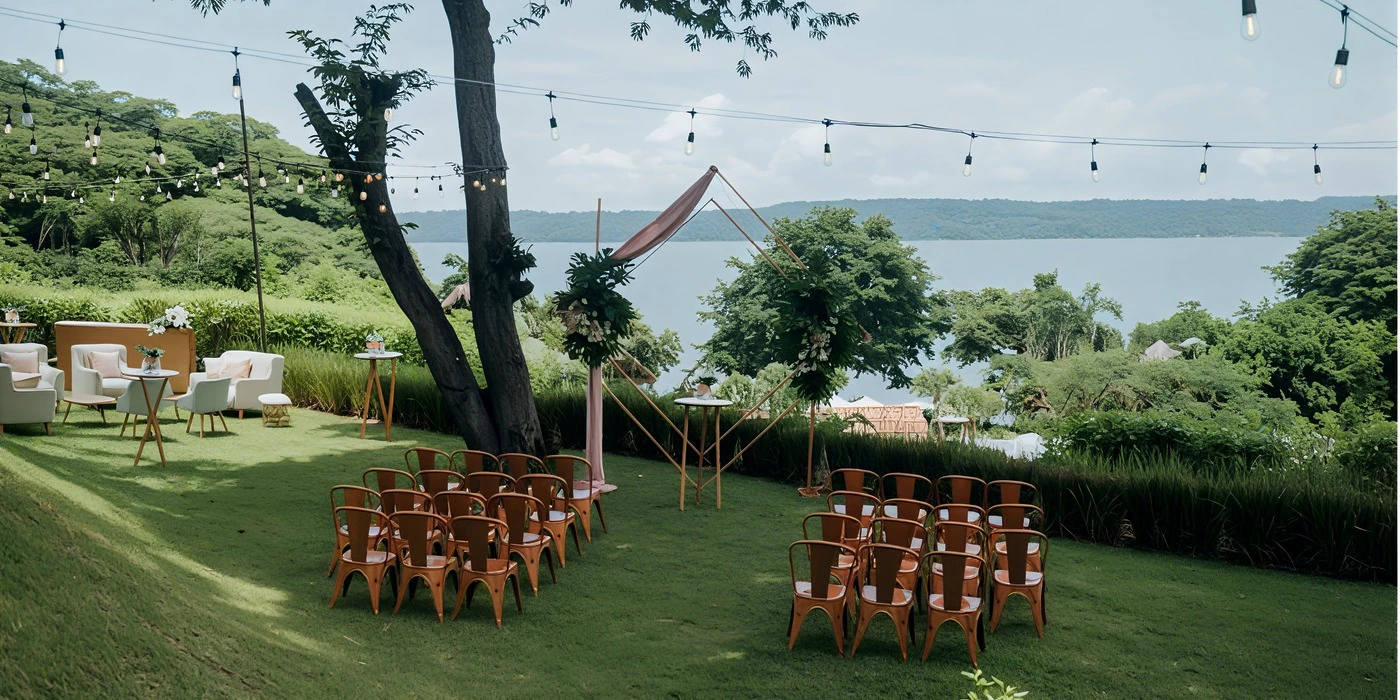 Palms View Garden wedding ceremony with lake views and tropical greenery at Secrets Papagayo