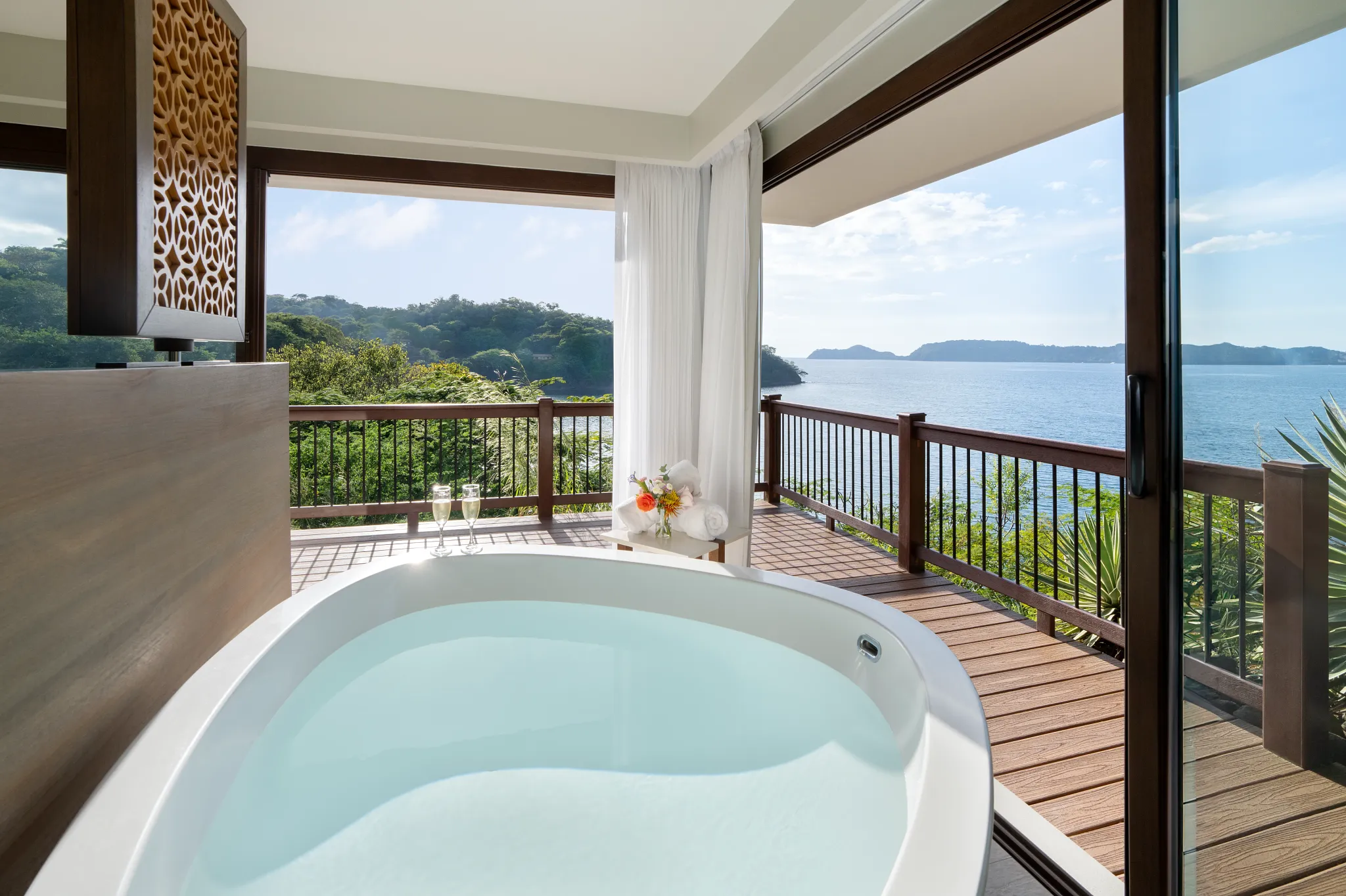 Preferred Club Honeymoon Suite soaking tub with ocean view terrace at Secrets Papagayo Costa Rica.