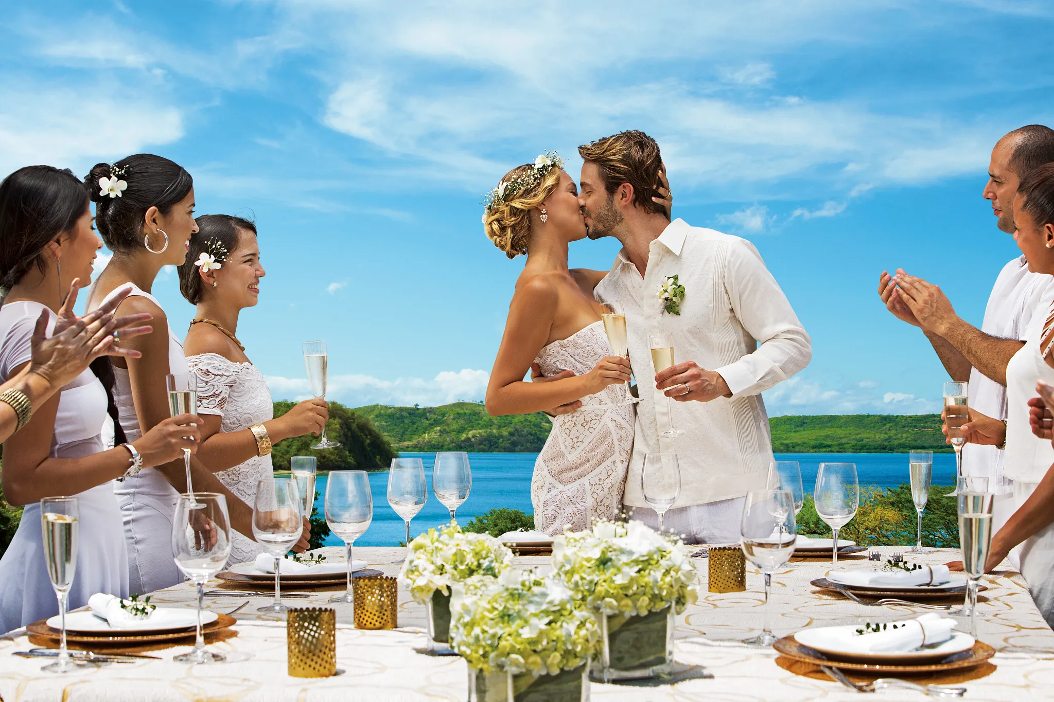 Wedding reception toast overlooking the ocean at Secrets Papagayo Costa Rica